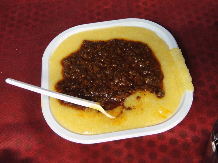Polenta with wild boar sauce in Capannuccia